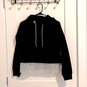 black hoodie was silver detail
